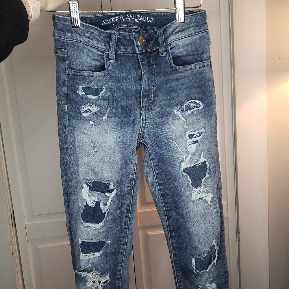 American eagle distressed covered jeans